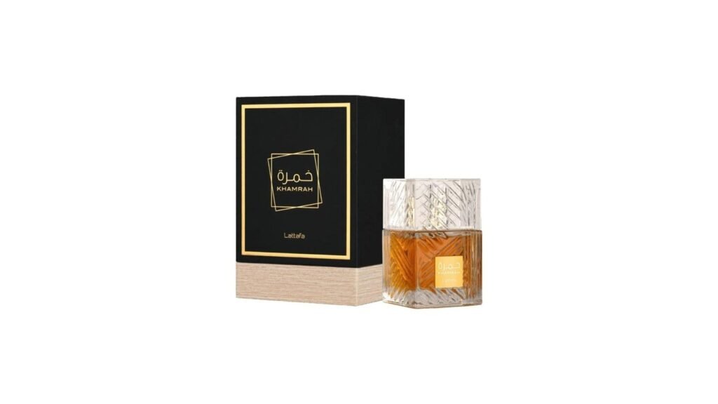 Lattafa Khamrah eau de parfum 100ml bottle beside its black and gold presentation box